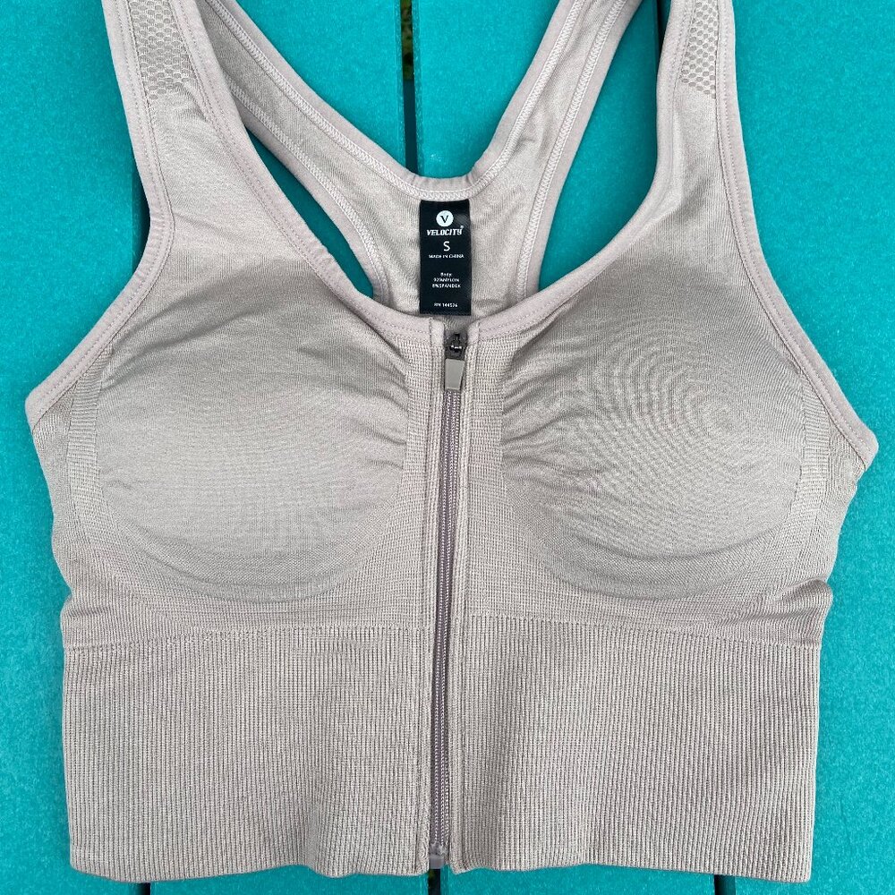 NWOT Velocity padded sports bra. Firm support, size Small. Beige/grey color.
